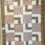 quilt in shades of beige