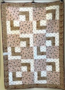 quilt in shades of beige